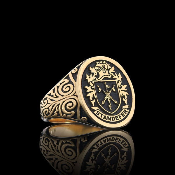 Ladies gold family crest ring