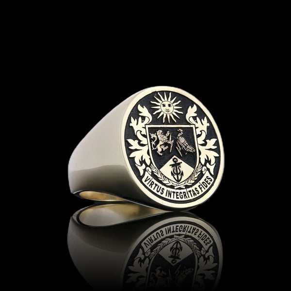 Detailed gold crest signet ring, showcasing family heritage with the motto Virtus Integritas Fides.