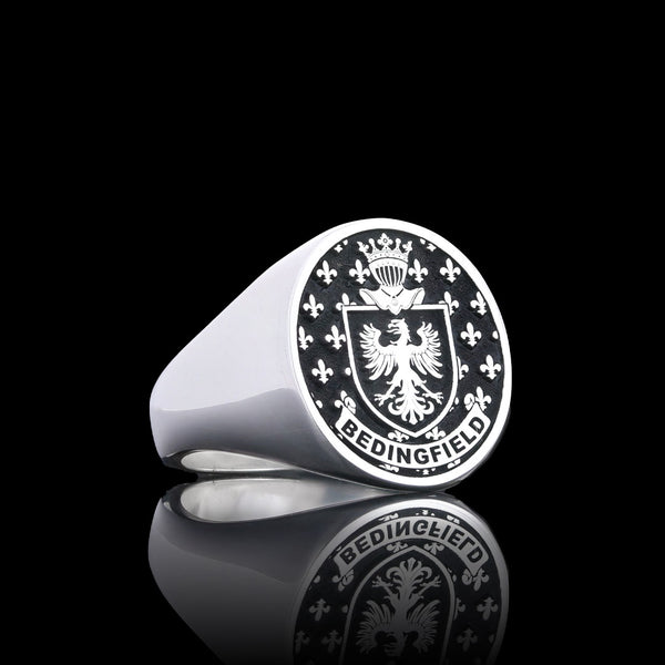 Stunning silver ring with the Bedingfield family crest, featuring an eagle and fleur-de-lis details.