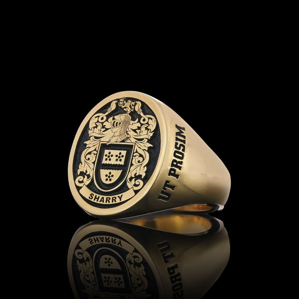 Sharry family gold signet ring with custom engraving on the sides, reflecting heritage and artistry.