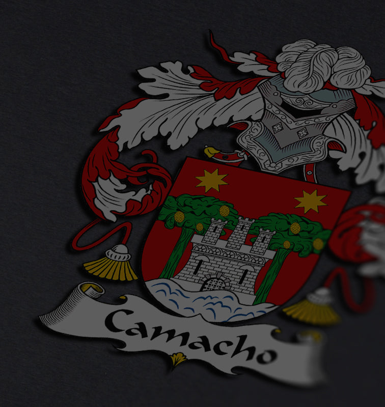 Camacho family crest on a dark gray background, showing a castle and trees with stars on a red shield.