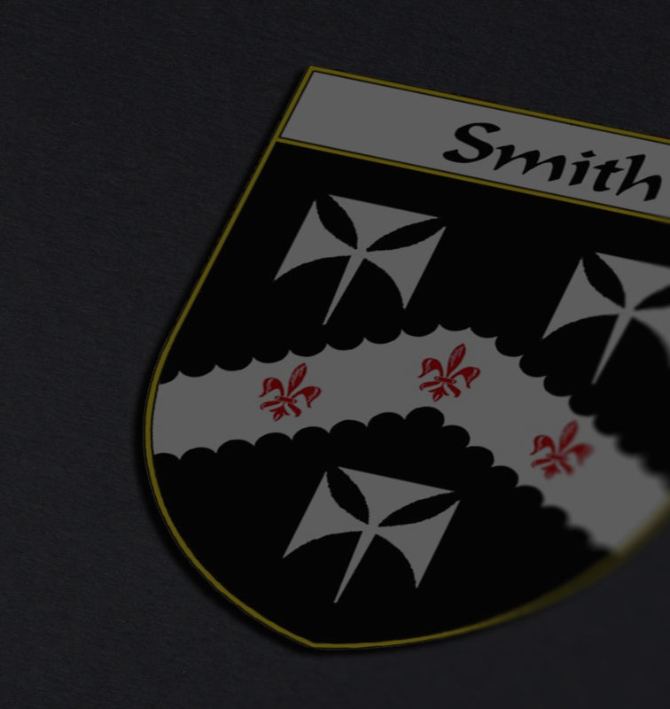 Smith family crest on a dark gray background, with black and white geometric patterns and red fleur-de-lis on a shield.